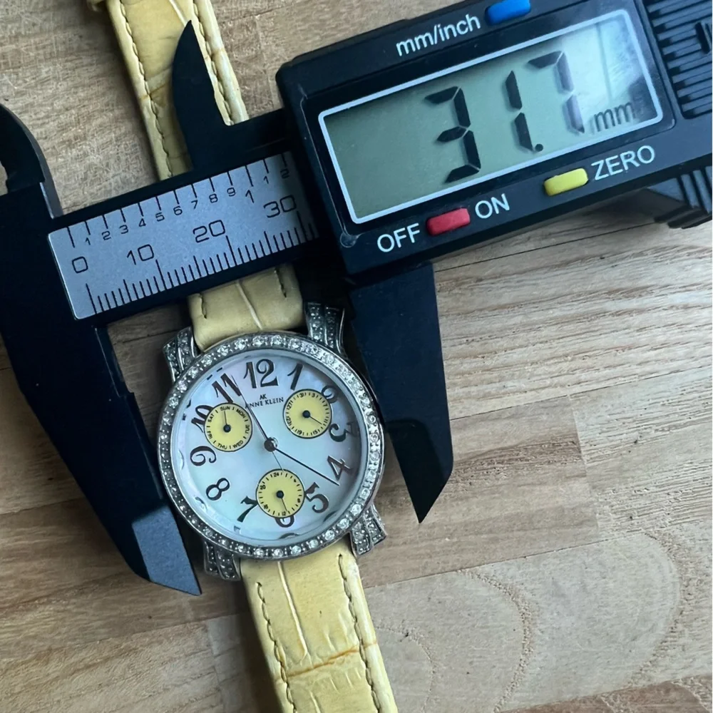 Anne Klein ladies silver tone yellow leather dress watch NEW BATTERY